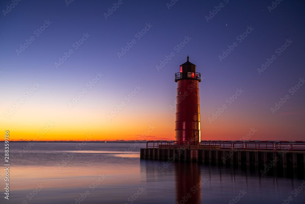 Lighthouse at sunrise on Lake Michigan in Milwaukee, WI