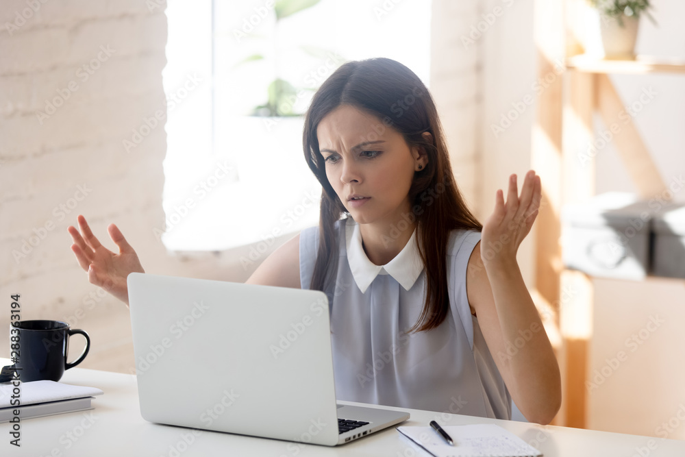 Confused girl feel frustrated having computer problems working