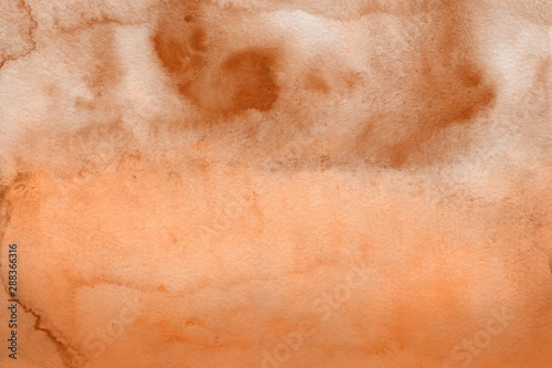 Orange watercolor abstract background with waves and strokes on white paper background. Trendy look. Chaotic abstract organic design.