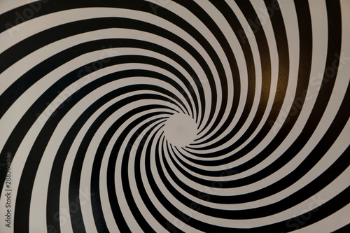 black white pattern rotating as background