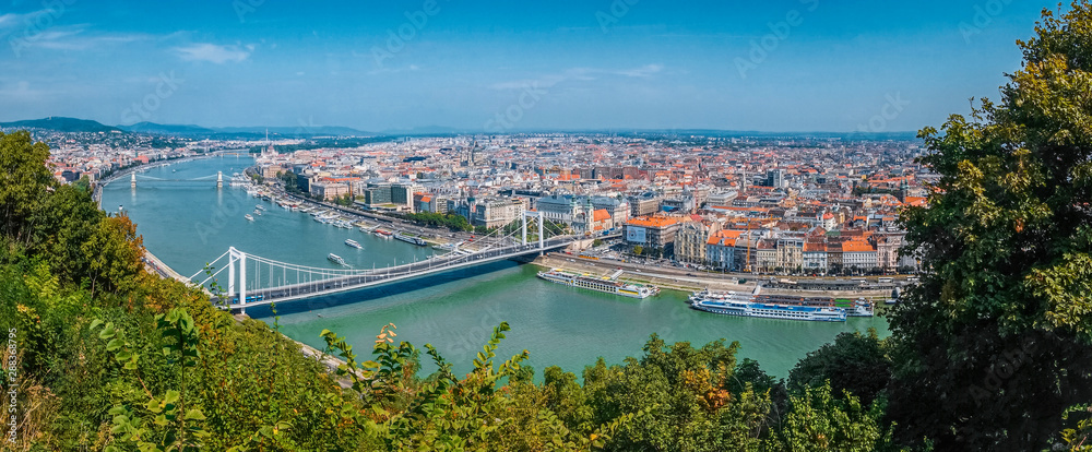 Budapest, Hungary - August 29, 2019: the Danube River bridges and the panorama of Budapest, the capital of Hungary, in the summer. A tourist trip to the ancient metropolitan cities of Europe