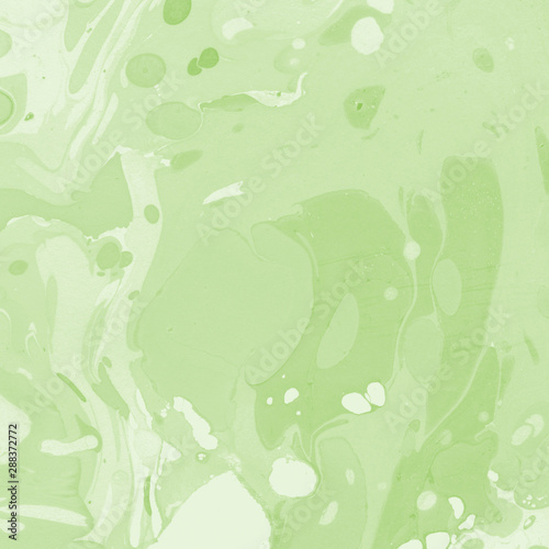Bright green marble ink paper textures on white background. Chaotic abstract organic design. 