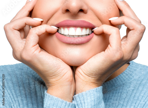 Fototapeta Naklejka Na Ścianę i Meble -  Happy smiling woman mouth with great teeth over white background.