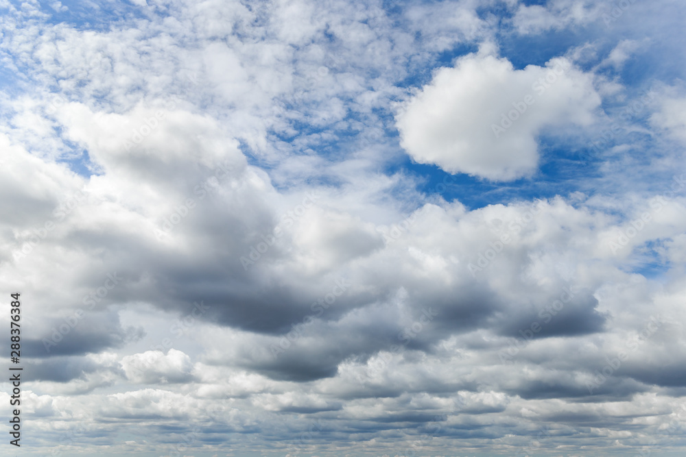 Blue sky covered with clouds. Image for backgrounds. Blue sky covered with clouds. Image for backgrounds.