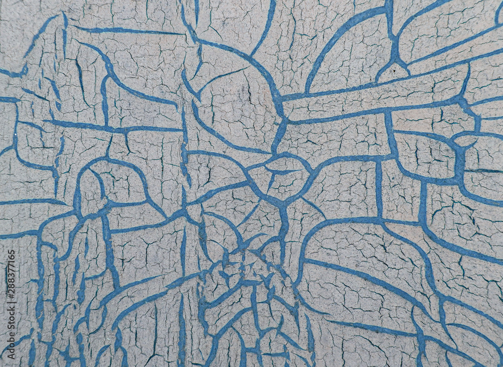 Obraz premium Cracked paint on wooden background, texture. Vintage wallpaper