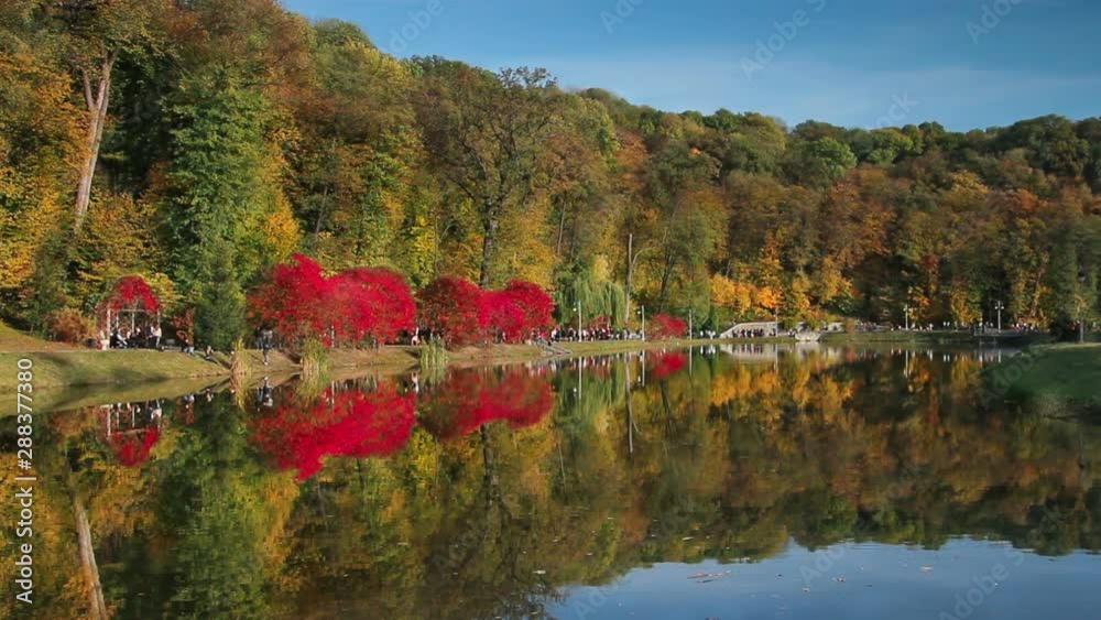 Slow transition from Summer season to colorful Autumn. Green trees become colorful. This footage has been shot in the same location from one angle at different times of the year. Ukraine, Kyiv.