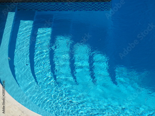 Steps to the swimming pool. View from above.