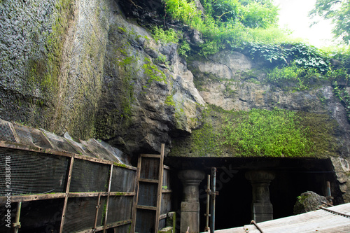 Construction and renovation in Historical Man made cave to save it from natural disaster.