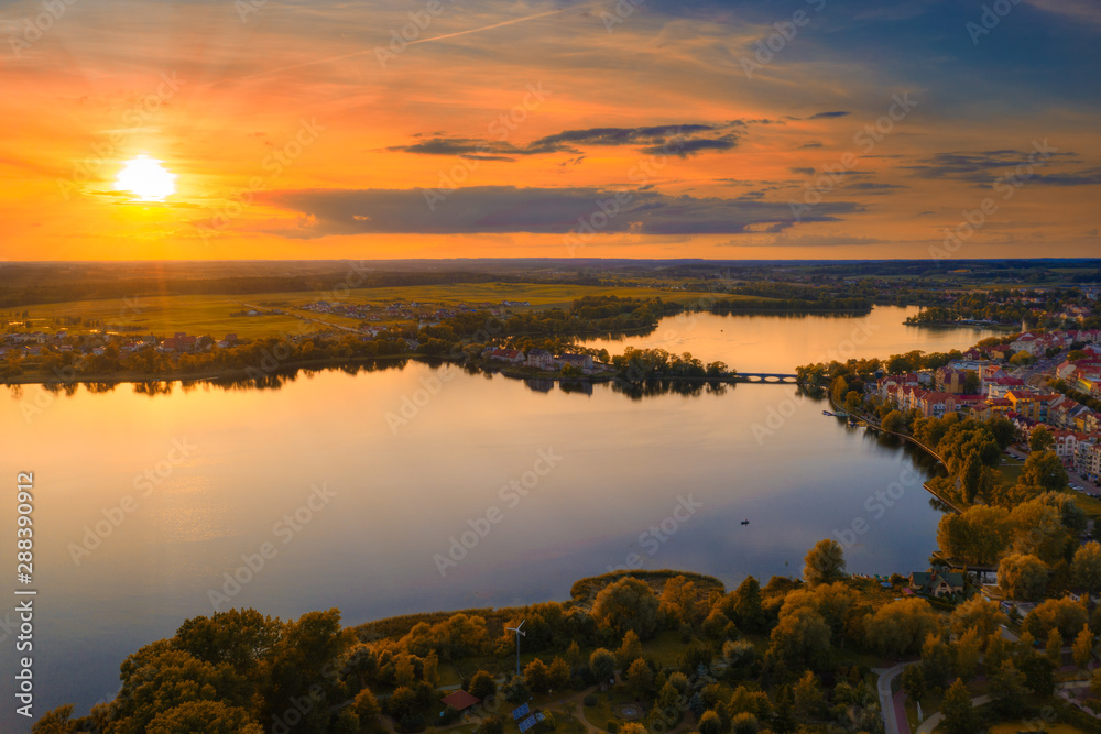 Sunset over Elk Lake near Elk city. Masuria, Poland.