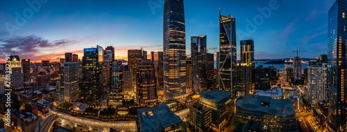 Blue hour with a pink sunset over San Francisco skyline with Salesforce Tower in the middle and Salesforce park at the bottom © Chris Anderson 