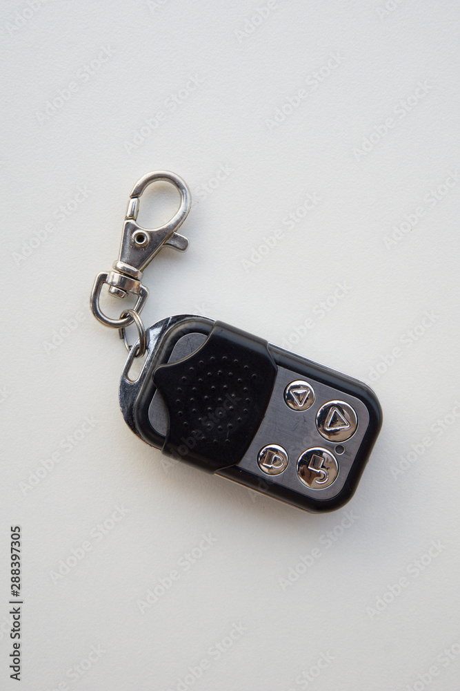 Automatic door remote with keychain isolated on a white background Automatic door remote with keychain isolated on a white background