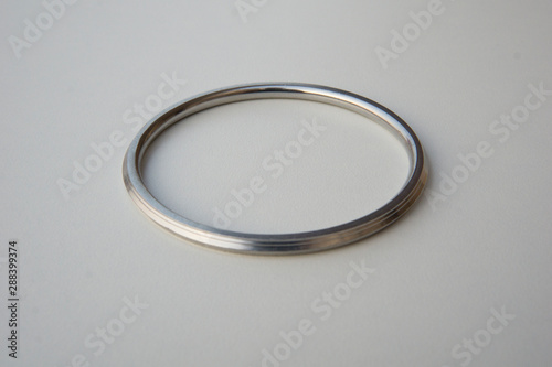 Simple Sikh Silver bangles on white background. Steel, metal or stainless bracelets isolated on white background.