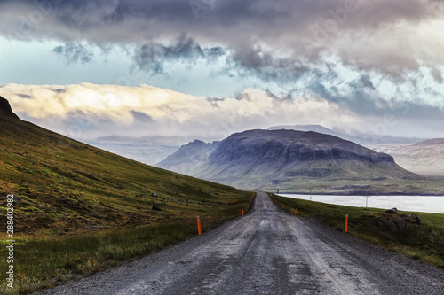 Ground road at hill side in Iceland. Off road adventure background.