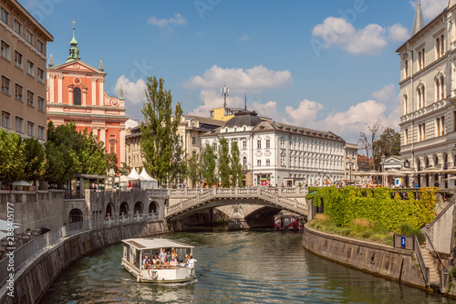 The famous "Triple Bridge" on the river located in the center of Ljubljana, the capital city of Slovenia 08.2019
