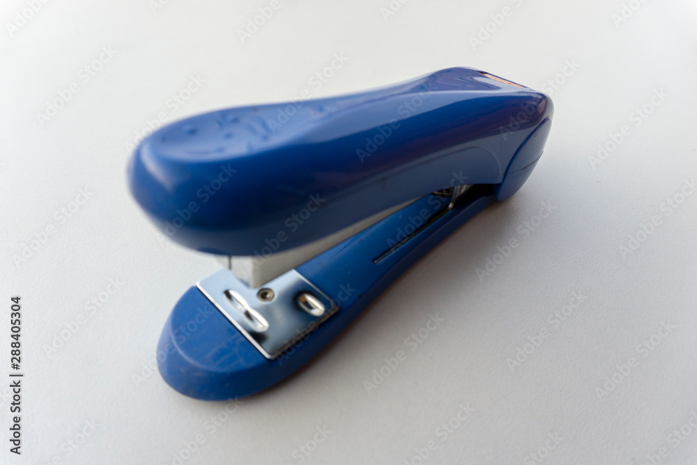 Blue stapler isolated on white background. Blue stapler isolated on white background.