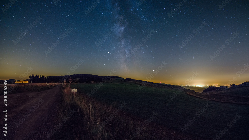 Panoramic night landscape near Oberried and Muenstertal in the Black Forest in Germany.