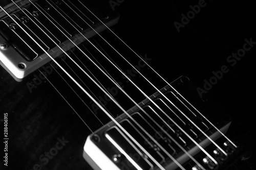 electric guitar, black & white, close-up