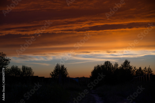 Sunset sky in summer village