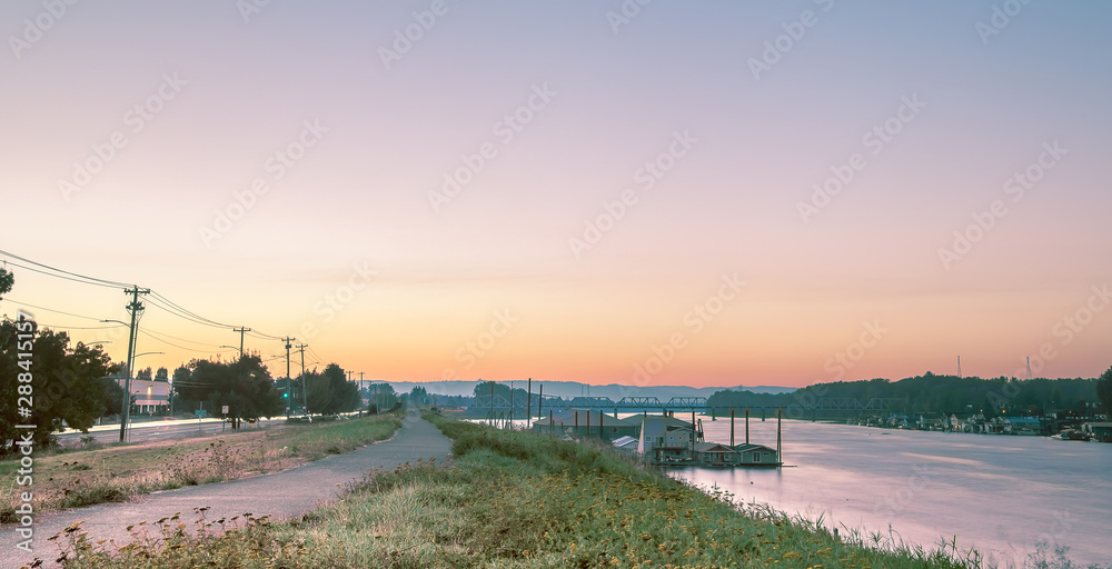 Walking path along Marine Drive and the Columbia River at Sunset