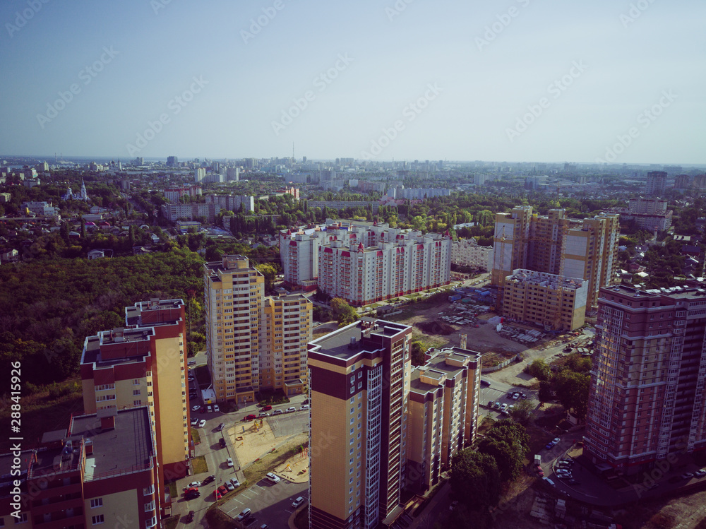 Fototapeta premium Modern apartment buildings on a sunny day with a blue sky. Facade of a modern apartment building. residential building modern apartment condominium architecture