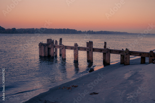A deteriorating old pier on Sauvie Island photo