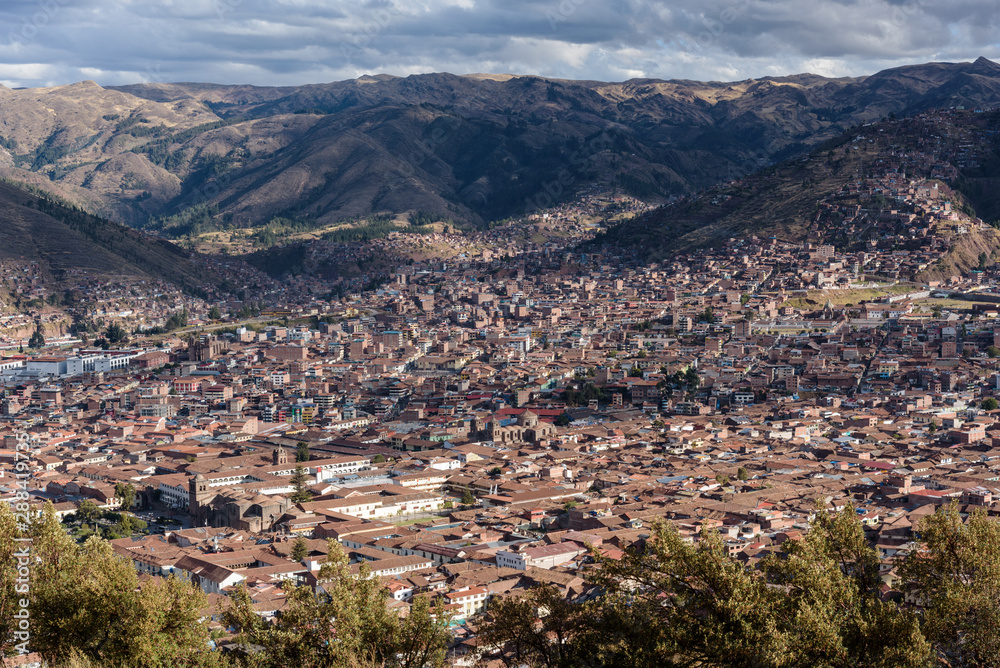 Panoramic City view of Cusco from Sacsayhuaman ruins in the hills, Peru, South America.