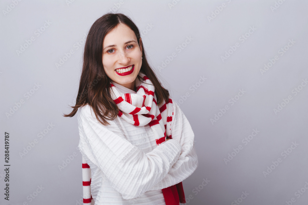 Cheerful young woman, with folded hands, is redy for christams, standing over isolated background Cheerful young woman, with folded hands, is redy for christams, standing over isolated background