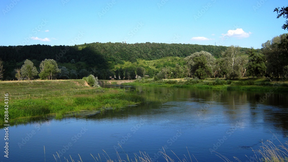 landscape with lake and blue sky