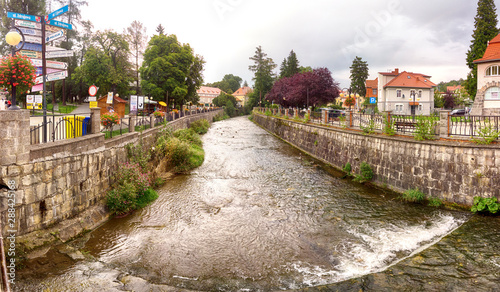 POLANICA ZDROJ, POLAND - AUGUST 26, 2019: Spa town Polanica Zdroj, Poland. The resort has the characteristics of a piedmont spa as it is situated in the valley of the River Bystrzyca Dusznicka. photo