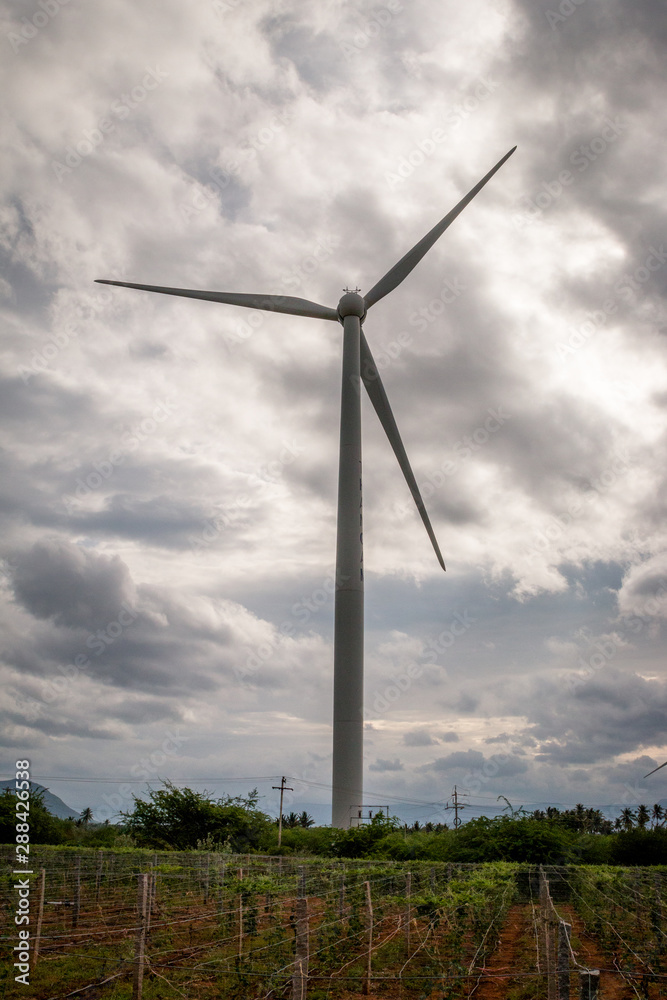 Windmill with cloudy background Windmill with cloudy background