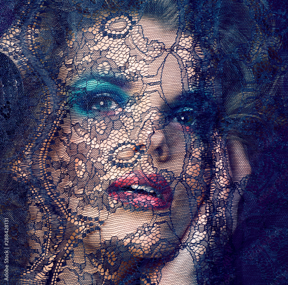 portrait of beauty young woman through lace close up mistery makeup sexy, fashion people concept