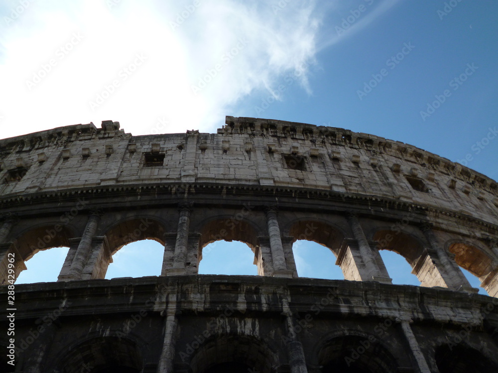 View of the Roman Colosseum outside against the blue sky. August 2012 