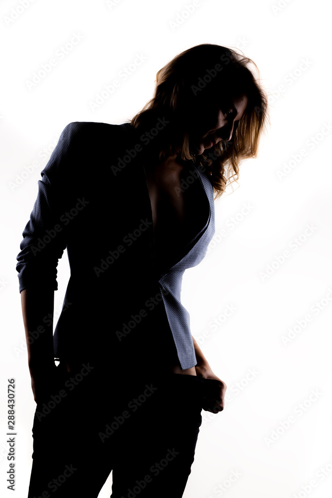 Fototapeta premium sexy girl in a suit, silhouette portrait