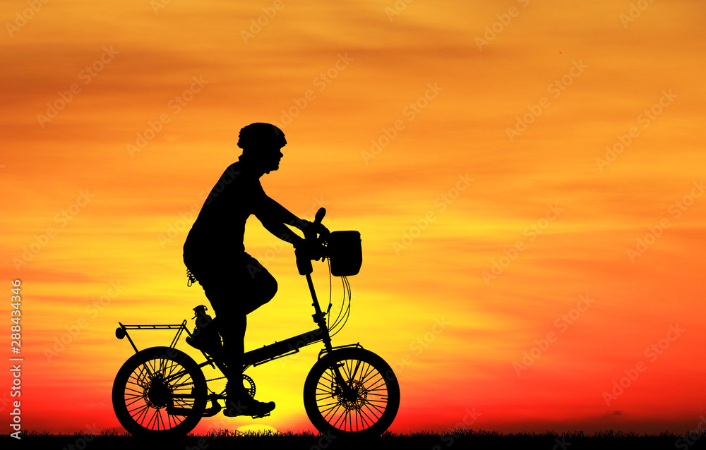 Silhouette Cycling on blurry sunrise sky background. Silhouette Cycling on blurry sunrise sky background.