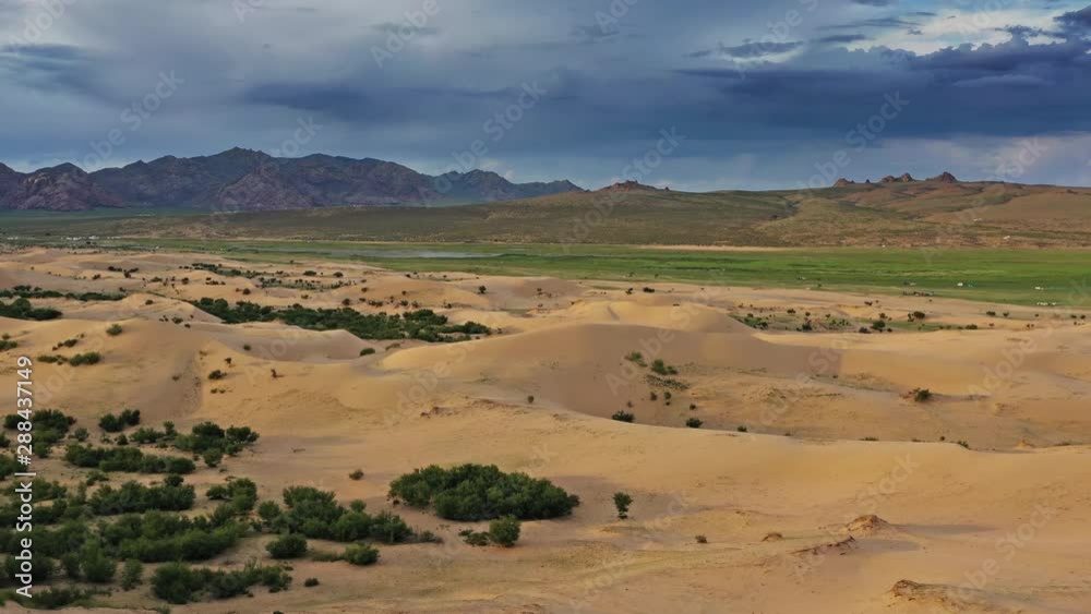 Aerial view of the sand dunes Elsen Tasarhai (Bayan Gobi) at sunset in Mongolia, 4k Aerial view of the sand dunes Elsen Tasarhai (Bayan Gobi) at sunset in Mongolia, 4k