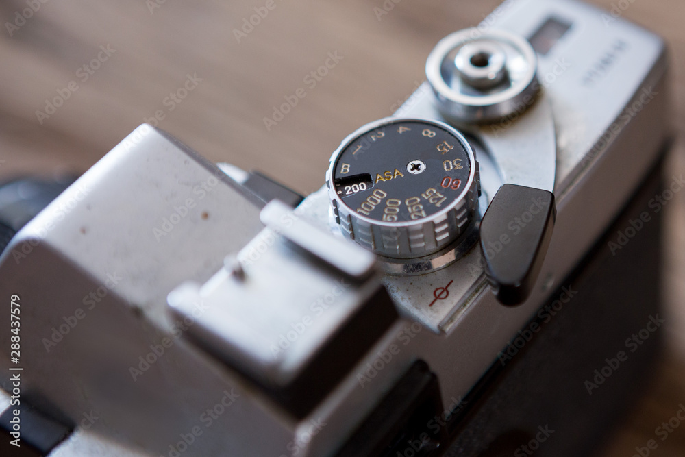 Close up and Selective focus of Old film camera on wooden background Close up and Selective focus of Old film camera on wooden background