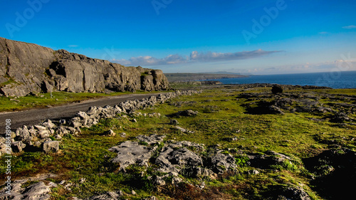 Road through Burren with cliffs County Clare Connacht Provice Ireland