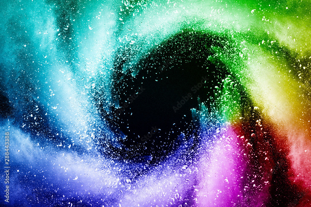 Fototapeta premium Explosion of colored powder isolated on black background. Abstract colored background. holi festival.