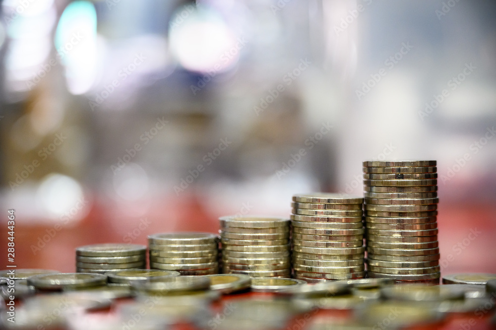 step of coins stacks, money, saving and investment or business planning concept.