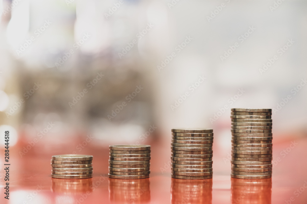step of coins stacks, money, saving and investment or business planning concept. step of coins stacks, money, saving and investment or business planning concept.