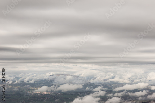 Fototapeta Naklejka Na Ścianę i Meble -  View from above of Umbria valley, with cloudscape both above and below