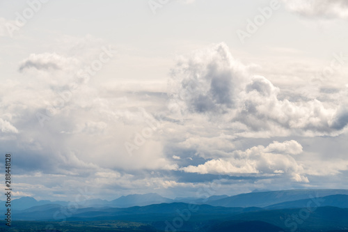 Clouds above the mountains in northern British Columbia, Canada © davidrh
