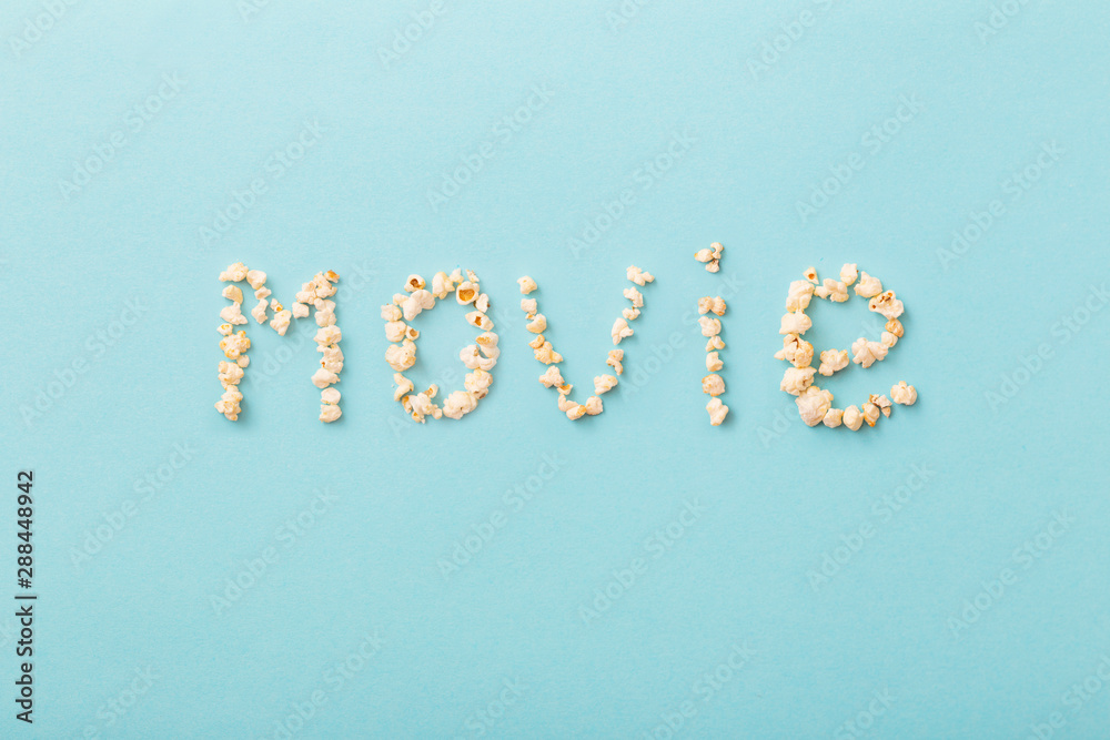 word movie made of popcorn on blue background word movie made of popcorn on blue background