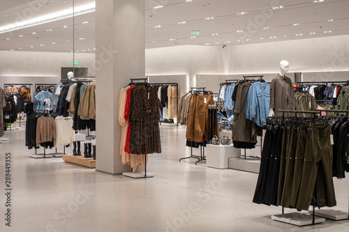 Foto Modern fashionable brand interior of clothing store inside shopping center