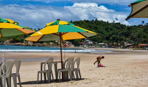 Fotografía banhista numa praia do recife