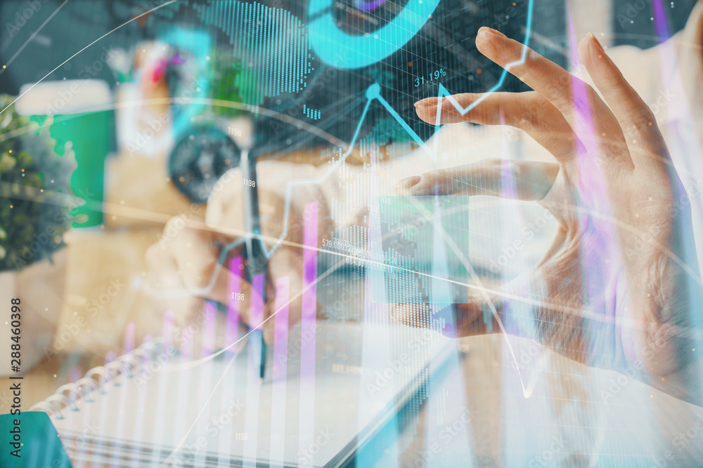 Forex chart displayed on woman's hand taking notes background. Concept of research. Multi exposure Forex chart displayed on woman's hand taking notes background. Concept of research. Multi exposure