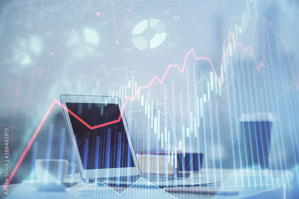 Forex graph hologram on table with computer background. Multi exposure. Concept of financial markets. Forex graph hologram on table with computer background. Multi exposure. Concept of financial markets.