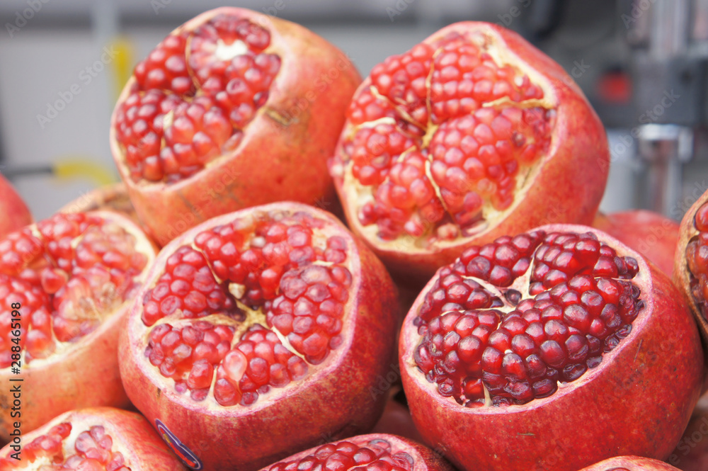 Pomegranate fruits is displayed for sale in the market.. Peeled to make it easier for customers to choose.