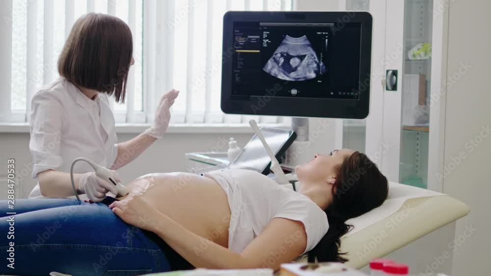 Pregnant woman on utltrasonographic examination at hospital Pregnant woman on utltrasonographic examination at hospital