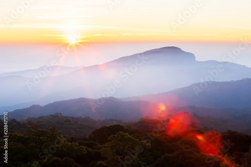 Wonderful sunrise over the mountain peak.